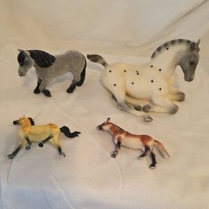 Set of Four Horse Figurines